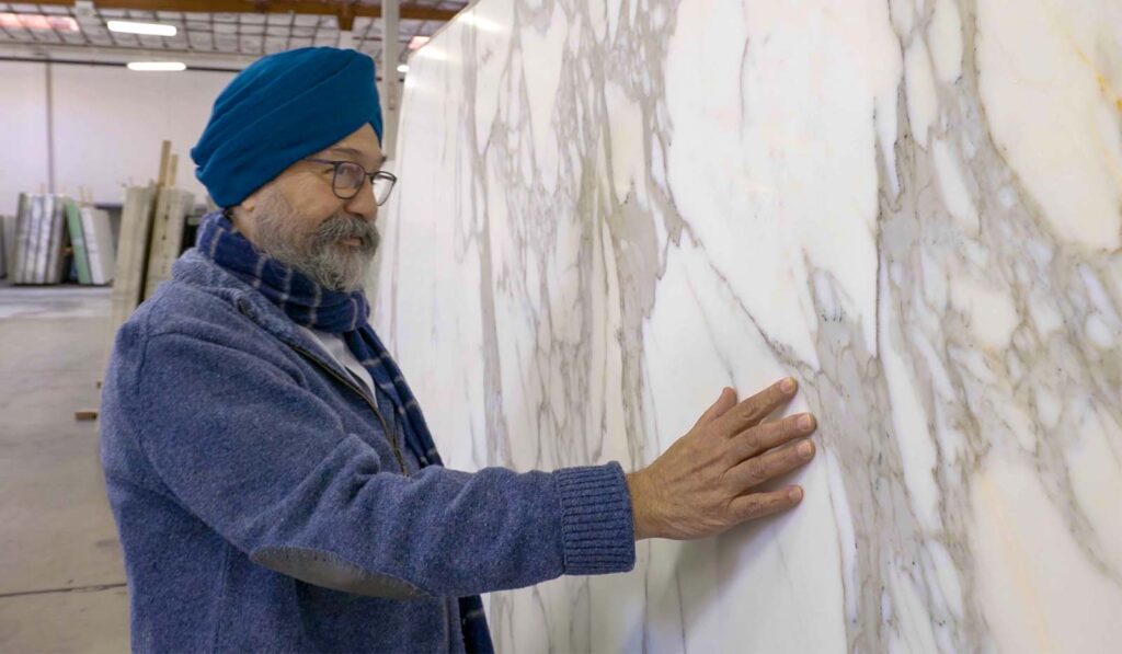 IRG’s Owner Dilmohan Chadha inspecting stone surface