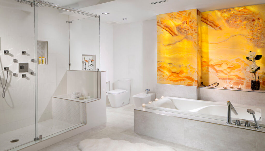 Bathroom with natural stone onyx lit from behind to show it's transparency.