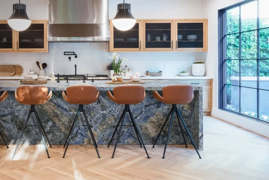 Azul Bahia exotic granite countertop in a modern kitchen with deep blue, white, black, and brown hues, ideal for luxurious and stylish kitchen designs.