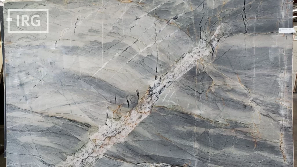 Ijen Blue quartzite countertop from IRG, offered in the Bay Area and Sacramento, with light blue patterns and contrasting dark veins, perfect for bold kitchen and bathroom designs