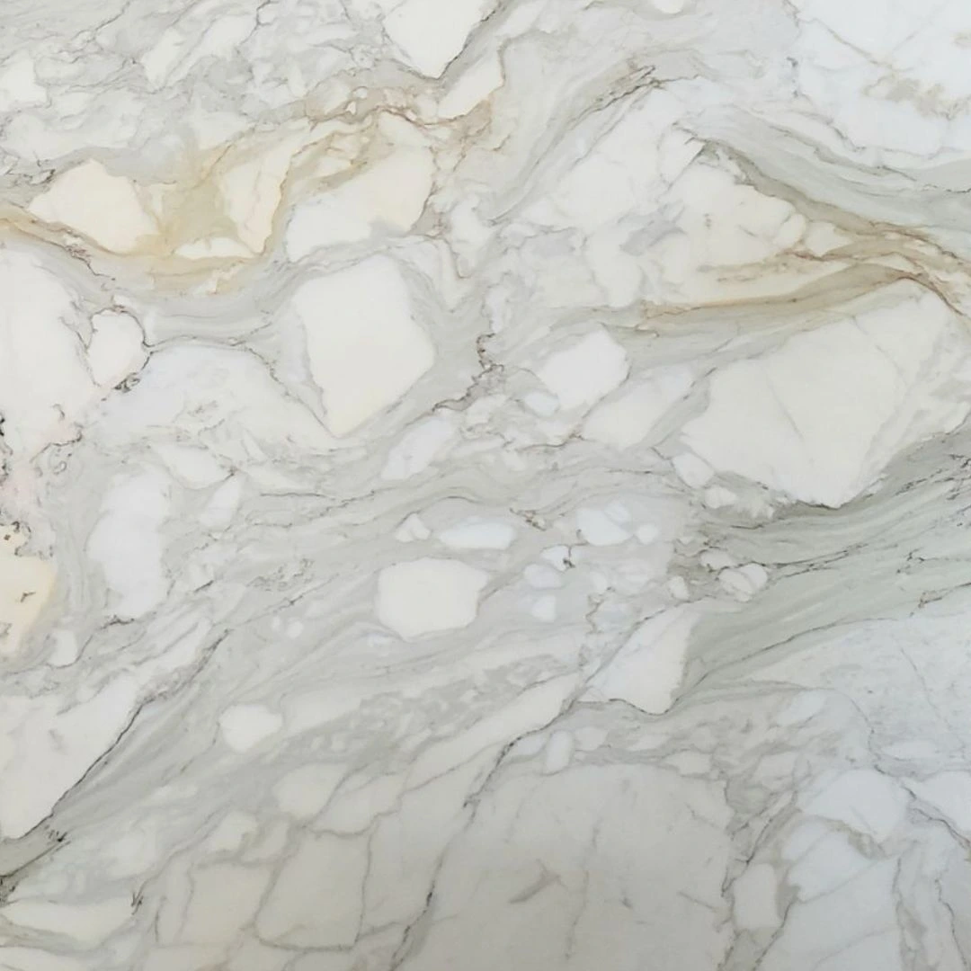 Calacatta Borghini Supreme honed marble slab with soft gray veining and subtle gold accents, suited for high-end kitchen islands and bathroom vanities